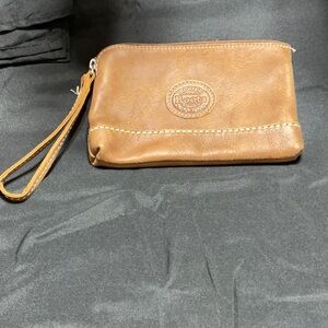 Roots Tan Leather Wristlet. Never used.